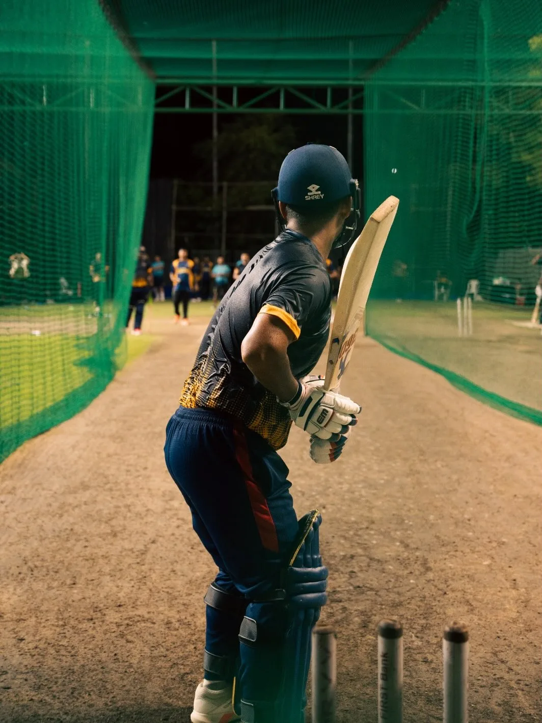 Batter taking guard in the practice nets