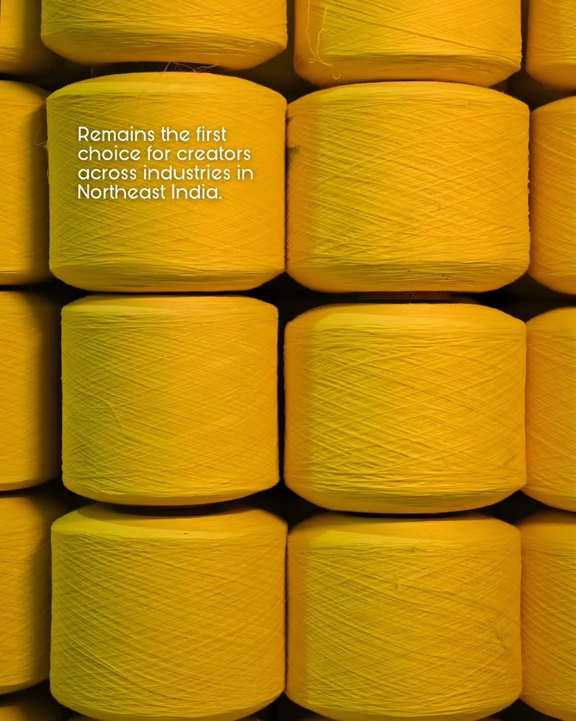 Rows of yellow yarn cones